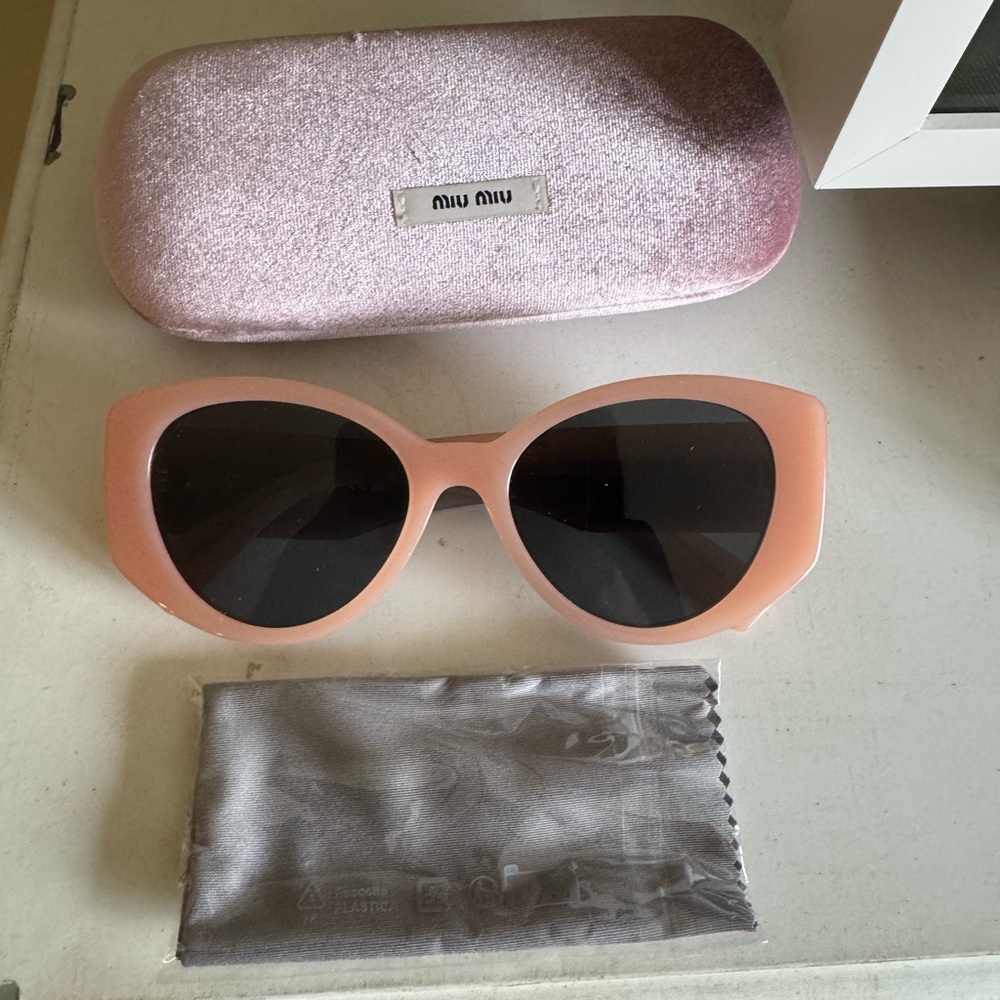 Miu miu sunglasses in pink opal